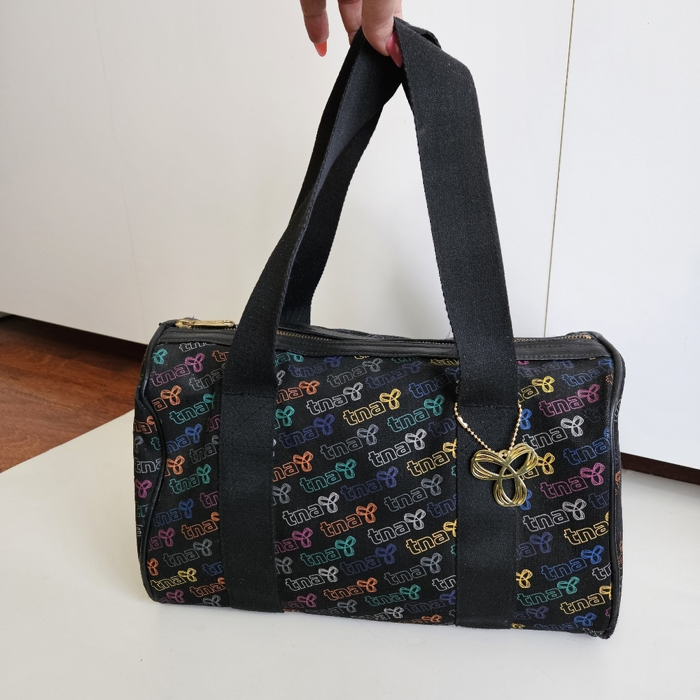 TNA Monogram Logo Y2K Duffle Bag ARITZIA